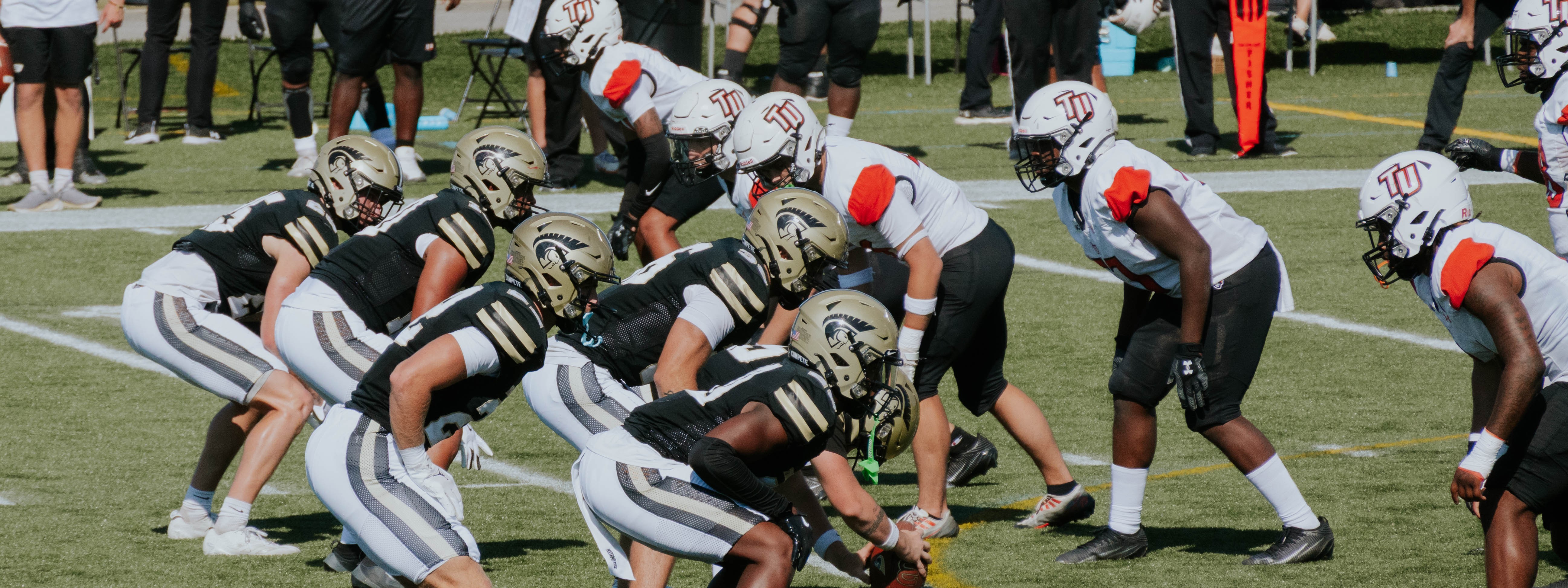 Anderson University football players on the field