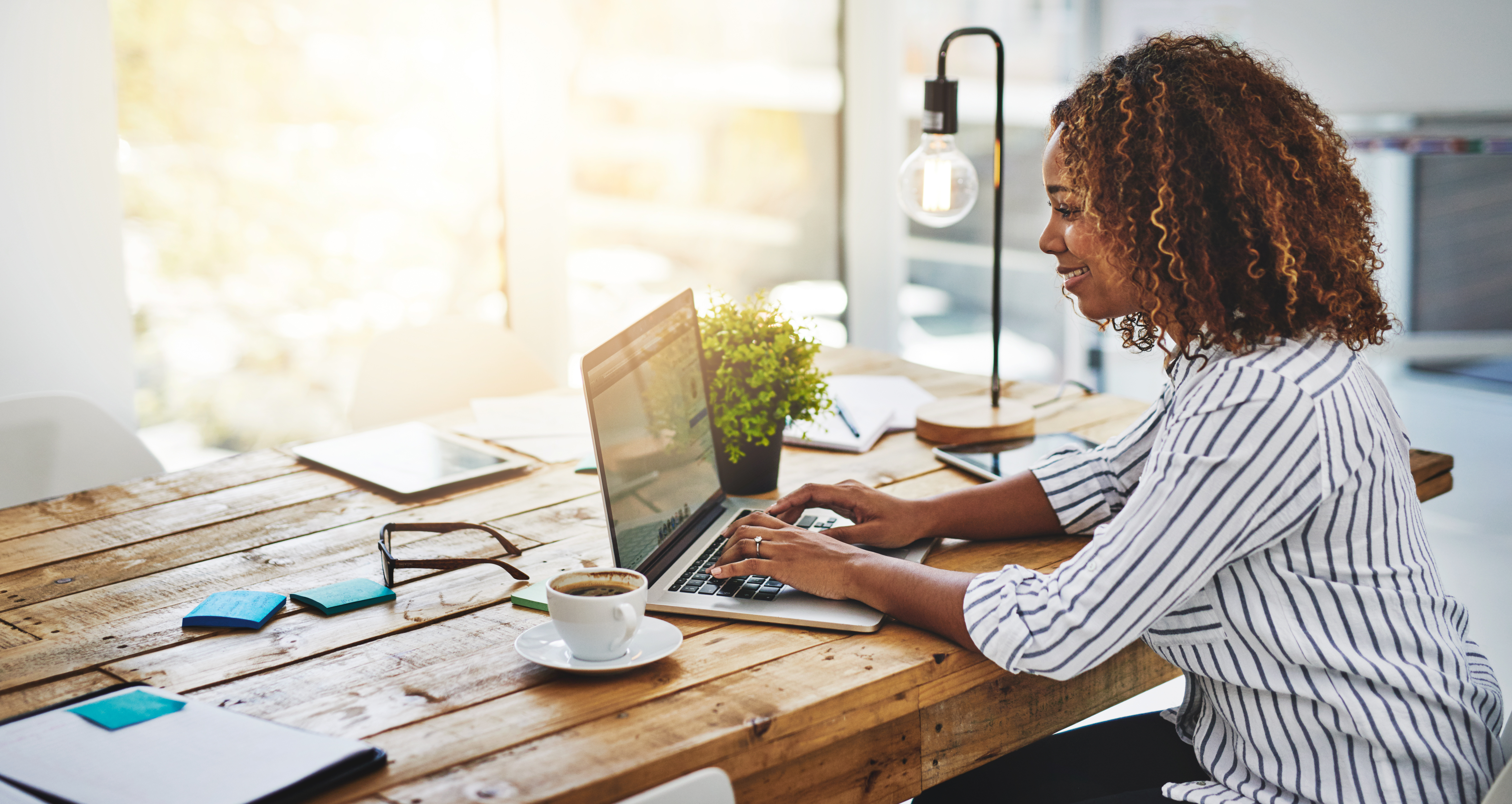 lady working remotely on her laptop